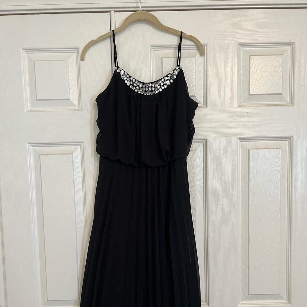 Ellicott long black dress with rhinestone embellishment.